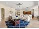 Spacious living area featuring tile floors, a large sectional sofa, and an open layout at 4608 Atwood Dr, Orlando, FL 32828