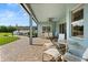 Inviting covered patio with ample seating, ideal for relaxation and outdoor entertaining at 4608 Atwood Dr, Orlando, FL 32828