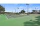 Well-maintained community tennis courts offer a great amenity for active residents and friendly competition at 4608 Atwood Dr, Orlando, FL 32828