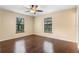 Bright bedroom with hardwood floors and lots of natural light at 4772 Lake Ridge Rd # 66, Orlando, FL 32808