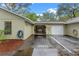 Exterior view of the home with a garage and driveway at 4772 Lake Ridge Rd # 66, Orlando, FL 32808