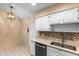 Bright kitchen featuring stainless steel appliances, and updated countertops at 4772 Lake Ridge Rd # 66, Orlando, FL 32808