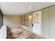 Covered patio featuring wood floors and a door at 4772 Lake Ridge Rd # 66, Orlando, FL 32808