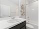 Bathroom with a shower-tub combo at 4783 Riverwalk Dr, St Cloud, FL 34771