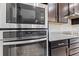 The kitchen features stainless steel appliances and a built in microwave and oven at 4783 Riverwalk Dr, St Cloud, FL 34771