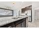Beautiful kitchen featuring granite counters, stainless steel appliances, and pendant lighting at 4783 Riverwalk Dr, St Cloud, FL 34771