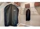 Walk-in closet with wire shelving and hanging garment bags, offering organized storage solutions at 531 Wayland Dr, Haines City, FL 33844