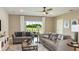 Inviting living room with a view of the outdoors, plush seating, and stylish decor at 531 Wayland Dr, Haines City, FL 33844