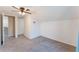 Cozy carpeted bedroom with neutral walls and a ceiling fan at 622 Tomlinson Ter, Lake Mary, FL 32746