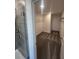 Spacious walk-in closet with carpet and wire shelving, offering ample storage space for clothes and accessories at 7116 Cherry Pasture Rd, Groveland, FL 34736