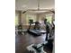 Brightly lit gym space featuring treadmills and other exercise equipment at 7606 Pissarro Dr # 14206, Orlando, FL 32819