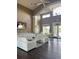 A bright lobby boasts high ceilings, comfortable seating, and views of the lake, creating an inviting space at 7606 Pissarro Dr # 14206, Orlando, FL 32819