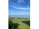 Scenic water view showcasing the serene landscape and picturesque surroundings of the neighborhood at 7606 Pissarro Dr # 14206, Orlando, FL 32819
