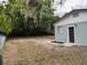 A spacious backyard with fencing, providing privacy and room for outdoor activities at 826 S Montgomery Ave, Deland, FL 32720