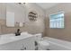 Well-lit bathroom with vanity, shower and tub at 826 S Montgomery Ave, Deland, FL 32720