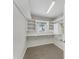 Organized laundry room with built-in shelves and storage space at 826 S Montgomery Ave, Deland, FL 32720