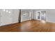 Bright living room with hardwood floors and views of the front yard at 826 S Montgomery Ave, Deland, FL 32720