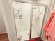 Glass shower with chrome fixtures and a tiled surround at 877 Rivers Crossings St, Clermont, FL 34714
