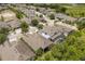 A residential community features modern homes with inviting pools, set against a backdrop of lush greenery at 886 Sherbourne Cir, Lake Mary, FL 32746