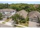 Beautifully landscaped homes feature well-manicured lawns, paver driveways, and lush green trees enhancing curb appeal at 886 Sherbourne Cir, Lake Mary, FL 32746