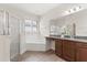 Bathroom features a separate glass shower, soaking tub and beautiful vanity at 886 Sherbourne Cir, Lake Mary, FL 32746