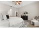 Bright bedroom features a ceiling fan, neutral walls, and stylish decor, creating a calming retreat at 886 Sherbourne Cir, Lake Mary, FL 32746