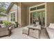 Cozy outdoor living space with brick flooring and a fire table at 886 Sherbourne Cir, Lake Mary, FL 32746
