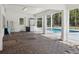 Back porch area overlooking pool at 949 Shadow Oaks Rd, Kissimmee, FL 34744