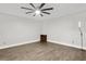 Bedroom with a ceiling fan and hardwood floors at 949 Shadow Oaks Rd, Kissimmee, FL 34744