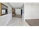 Open foyer features marble flooring, brick fireplace, and views to the living area at 949 Shadow Oaks Rd, Kissimmee, FL 34744