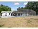 Backyard with a pool with screen at 949 Shadow Oaks Rd, Kissimmee, FL 34744