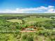 Aerial view of large lot with potential property lines highlighted at 9506 Number Two Rd, Howey In The Hills, FL 34737
