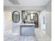 Modern kitchen featuring sleek countertops and stainless steel appliances, seamlessly connected to the living space at 9506 Number Two Rd, Howey In The Hills, FL 34737