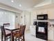 Kitchen area with breakfast nook, granite countertops, and stainless steel microwave at 970 Courtland Blvd, Deltona, FL 32738