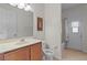 Bathroom featuring a vanity with a marble countertop and a shower and bathtub combination at 9852 Caroline Park Dr, Orlando, FL 32832