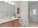 Bathroom featuring a vanity with a marble countertop and a shower and bathtub combination at 9852 Caroline Park Dr, Orlando, FL 32832