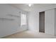 Bedroom with a window, a closet, and built-in shelving at 9852 Caroline Park Dr, Orlando, FL 32832