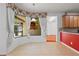 Breakfast nook area with tile floors and large window overlooking the backyard at 9852 Caroline Park Dr, Orlando, FL 32832