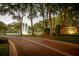 Community entrance with brick signage and a water fountain, showcasing a welcoming and upscale atmosphere at 1070 Henley Downs Pl, Lake Mary, FL 32746