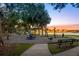 Community playground near a lake with a walking path, playground equipment and lots of room to play at 1070 Henley Downs Pl, Lake Mary, FL 32746