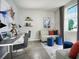 Stylish home office featuring a modern desk, comfortable seating, and ample natural light at 1114 Cumberland Trail Dr, Lake Hamilton, FL 33851