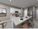 Modern kitchen with stainless steel appliances, granite countertops, and a breakfast bar with seating at 1123 Cumberland Trail Dr, Lake Hamilton, FL 33851