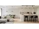 Open-concept living area with modern kitchen, dining space, and sleek contemporary design elements at 11302 Westwood Blvd # 28, Orlando, FL 32821