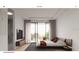 Serene main bedroom featuring a large bed, minimalist decor, and a private balcony view at 11302 Westwood Blvd # 28, Orlando, FL 32821