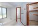 Bathroom with a soaking tub next to a large window and access to the closet at 1241 Leatherwood Dr, Altamonte Springs, FL 32714