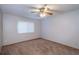 Neutral bedroom featuring carpet, a ceiling fan, and a window at 1241 Leatherwood Dr, Altamonte Springs, FL 32714