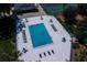 Aerial view of a sparkling community pool and deck with lounge chairs and tables at 1241 Leatherwood Dr, Altamonte Springs, FL 32714