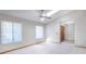 Bright living room with tile flooring, a skylight, a ceiling fan and wood trim at 1241 Leatherwood Dr, Altamonte Springs, FL 32714
