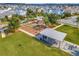 Aerial view of the playground and picnic shelter surrounded by green space and lush trees in the community at 14826 Deaton Aly, Orlando, FL 32827
