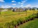 Community playground on a large grassy lot in a residential neighborhood at 14826 Deaton Aly, Orlando, FL 32827